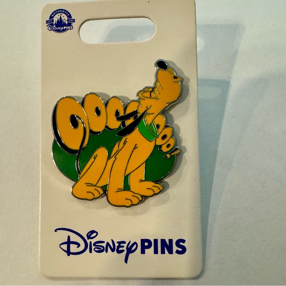 NWT. Join Pluto for a ''howling'' good time pin